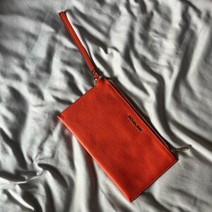 Michael Kors Orange Pebbled Leather Wristlet